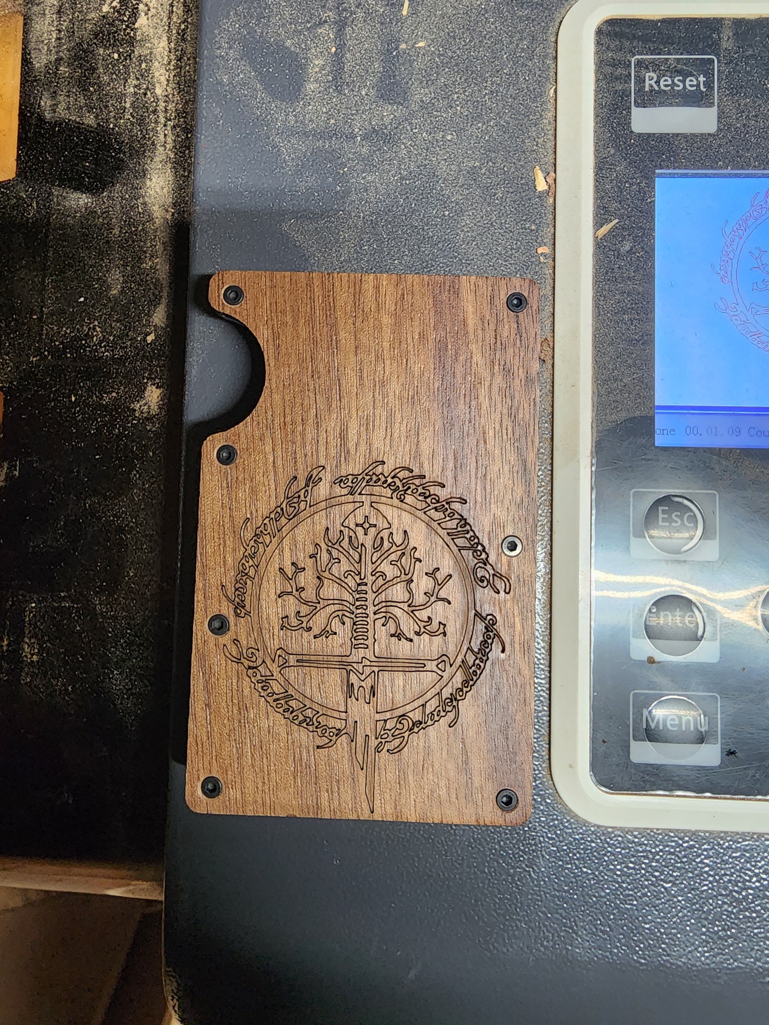 Engraved round wood piece